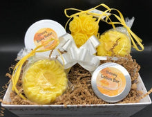 Load image into Gallery viewer, This adorable gift basket is sure to brighten anyone&#39;s day!  Packed full of amazing products to sooth away that special someone&#39;s cares &amp; add a bit of sunshine to their days.  Set contains one rose pillar candle, one honey body butter, two sunflower goat&#39;s milk soaps and one honey lotion bar all packed up and ready to go.  Perfect for Mother&#39;s Day gifts, Birthday gifts, Get Well Soon gifts or just to let someone know you&#39;re thinking of them.  
