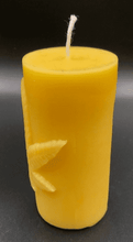 Load image into Gallery viewer, Leaf design beeswax candle. Leaf design on front of this candle shown with green sparkle mica leaf.