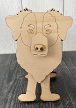 Load image into Gallery viewer, Let his adorable little dog keep your eyeglasses safe while you sleep.  Glasses rest across the dog's nose.  These Eyeglass holders are a MUST for children & adults alike.  Keep your glasses safe from scratches.  Also makes a great gift!