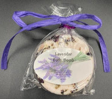 Load image into Gallery viewer, Lavender themed gift basket all ready to deliver to your loved ones. Basket includes a body butter, a lotion bar, a bath bomb, an all natural beeswax candle (unscented) & a soap bar. An additional body butter or bath product can be substituted for the candle. Handmade in the USA.