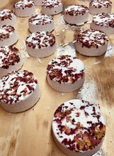 Load image into Gallery viewer, Making lavender bath bombs with rose petals on top.  These beautiful bath bombs sooth your skin while relaxing your mind with their wonderful lavender scent.  We only use high quality essential oils in our bath bombs.