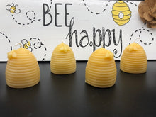 Load image into Gallery viewer, 2" Beehive all natural beeswax candle with bee on the side. Handmade in the USA.
