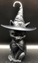 Load image into Gallery viewer, A beautiful addition to any Halloween display, this Black Cat Beeswax Candle sports a black witches hat with the triple moon on the front.