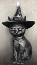 Load image into Gallery viewer, A beautiful addition to any Halloween display, this Black Cat Beeswax Candle sports a black witches hat with the triple moon on the front.
