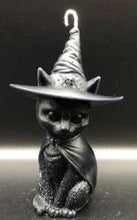 Load image into Gallery viewer, A beautiful addition to any Halloween display, this Black Cat Beeswax Candle sports a black witches hat with the triple moon on the front.
