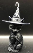 Load image into Gallery viewer, A beautiful addition to any Halloween display, this Black Cat Beeswax Candle sports a black witches hat with the triple moon on the front.