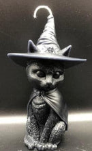 Load image into Gallery viewer, A beautiful addition to any Halloween display, this Black Cat Beeswax Candle sports a black witches hat with the triple moon on the front.