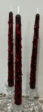 Load image into Gallery viewer, Add that extra bit of creepy to your Halloween decor with these 10" Bloody Black Taper Beeswax Candles.  Drops & smears of blood decorate the outside of these incredible tapers.  Perfect for your Halloween party!