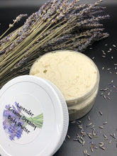 Load image into Gallery viewer, Lavender themed gift basket all ready to deliver to your loved ones. Basket includes a body butter, a lotion bar, a bath bomb, an all natural beeswax candle (unscented) & a soap bar. An additional body butter or bath product can be substituted for the candle. Handmade in the USA.
