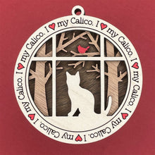Load image into Gallery viewer, Share the love for our furry friends with these beautiful cat ornaments!  100 different options available.  Send us the name you'd like personalized on it & we'll add it to your ornament.  Our standard background is the trees with the cardinal in them.  If you'd like a different background, please contact us.