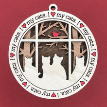 Load image into Gallery viewer, Share the love for our furry friends with these beautiful cat ornaments!  100 different options available.  Send us the name you'd like personalized on it & we'll add it to your ornament.  Our standard background is the trees with the cardinal in them.  If you'd like a different background, please contact us.