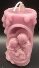 Load image into Gallery viewer, These beautifully detailed Religious Candles depict four different bible scenes - Jesus on the cross, the Virgin Mary, the Holy Family & the Nativity manger scene.  Bring the spirit of Christ into your home with these gorgeous beeswax candles.  They make fantastic gifts, are great for Christmas decor, housewarming gifts, holiday centerpieces and alters.  Available in purple, blue or natural yellow beeswax.  **** Please note desired color when ordering.