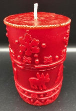 Load image into Gallery viewer, A great addition to any holiday decor, this Christmas Beeswax Pillar Candle is decorated with snowflakes, Christmas trees and cute little moose. Makes a wonderful gift, addition to your Christmas decor, or as a centerpiece. Available in red, green or natural yellow beeswax.
