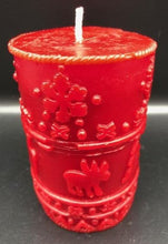 Load image into Gallery viewer, A great addition to any holiday decor, this Christmas Beeswax Pillar Candle is decorated with snowflakes, Christmas trees and cute little moose. Makes a wonderful gift, addition to your Christmas decor, or as a centerpiece. Available in red, green or natural yellow beeswax.