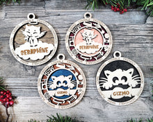 Load image into Gallery viewer, Share the love for our furry friends with these beautiful cat ornaments!  7 different options available.  Send us the name you'd like personalized on it & we'll add it to your ornament.  Please let us know if you'd like a certain background color