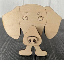 Load image into Gallery viewer, Let his adorable little dog keep your eyeglasses safe while you sleep.  Glasses rest across the dog's nose.  These Eyeglass holders are a MUST for children & adults alike.  Keep your glasses safe from scratches.  Also makes a great gift!