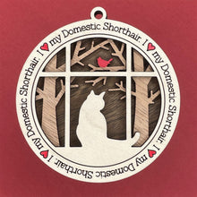 Load image into Gallery viewer, Share the love for our furry friends with these beautiful cat ornaments!  100 different options available.  Send us the name you'd like personalized on it & we'll add it to your ornament.  Our standard background is the trees with the cardinal in them.  If you'd like a different background, please contact us.