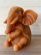 Load image into Gallery viewer, Gorgeous Elephant / Ganesh Beeswax Candle is adorned in a decorative blanket & headpiece.  Elephants are symbolized as removers of obstacles and a provider of fortune and good luck.