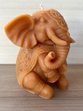Load image into Gallery viewer, Gorgeous Elephant / Ganesh Beeswax Candle is adorned in a decorative blanket & headpiece.  Elephants are symbolized as removers of obstacles and a provider of fortune and good luck.