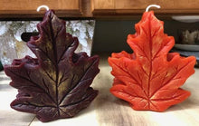 Load image into Gallery viewer, Get ready for the leaves changing colors & crisp fall days with this beautiful Fall Leaves Beeswax Candle.  Adds a beautiful touch to centerpieces, Thanksgiving decor or Halloween decor.  Available in orange, burgundy or yellow with a sparkly center.
