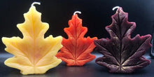 Load image into Gallery viewer, Get ready for the leaves changing colors & crisp fall days with this beautiful Fall Leaves Beeswax Candle.  Adds a beautiful touch to centerpieces, Thanksgiving decor or Halloween decor.  Available in orange, burgundy or yellow with a sparkly center.
