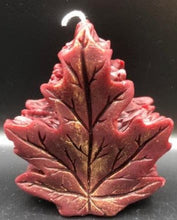 Load image into Gallery viewer, Get ready for the leaves changing colors & crisp fall days with this beautiful Fall Leaves Beeswax Candle.  Adds a beautiful touch to centerpieces, Thanksgiving decor or Halloween decor.  Available in orange, burgundy or yellow with a sparkly center.