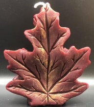 Load image into Gallery viewer, Get ready for the leaves changing colors & crisp fall days with this beautiful Fall Leaves Beeswax Candle.  Adds a beautiful touch to centerpieces, Thanksgiving decor or Halloween decor.  Available in orange, burgundy or yellow with a sparkly center.