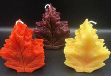 Load image into Gallery viewer, Get ready for the leaves changing colors & crisp fall days with this beautiful Fall Leaves Beeswax Candle.  Adds a beautiful touch to centerpieces, Thanksgiving decor or Halloween decor.  Available in orange, burgundy or yellow with a sparkly center.
