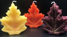 Load image into Gallery viewer, Get ready for the leaves changing colors & crisp fall days with this beautiful Fall Leaves Beeswax Candle.  Adds a beautiful touch to centerpieces, Thanksgiving decor or Halloween decor.  Available in orange, burgundy or yellow with a sparkly center.
