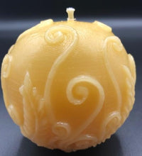 Load image into Gallery viewer, Adorable all natural beeswax ball candle with fern leaves and fiddleheads adorning the sides. Handmade in the USA.