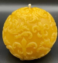 Load image into Gallery viewer, Fleur de lis designs adorn this all natural beeswax ball candle. Handmade in the USA.
