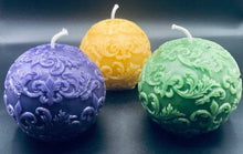 Load image into Gallery viewer, Fleur de Lis Beeswax Ball Candles in fun Mardi Gras colors of purple, green & gold.