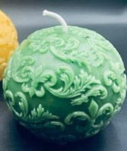 Load image into Gallery viewer, Fleur de Lis Beeswax Ball Candles. Fleur de Lis symbol engraved on the sides of this beautiful ball candle.