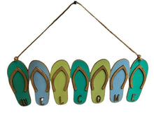 Load image into Gallery viewer, Add a bit of summer to your entry way with this Flip Flop Welcome Door Hanger Sign.  These adorable flip flops spelling out WELCOME invite guest into your home.  Perfect for lake houses, beach retreats or just to add a bit of summer decor.