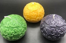 Load image into Gallery viewer, Fleur de Lis Beeswax Ball Candles in fun Mardi Gras colors of purple, green & gold.