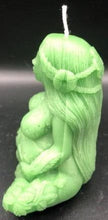 Load image into Gallery viewer, Our beautifully detailed Gaia / Mother Earth Beeswax Candle brings a bit of nature’s beauty into our homes & reminds us to be grateful for all that nature gives us.  She holds the Earth in her hands with stars and the sun above, the plants decorate her limbs, and the infinity symbol decorates her forehead (third eye).   A wonderful gift for nature lovers or to include with meditation practices.