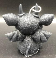 Load image into Gallery viewer, These amazing Gargoyle Beeswax Candles will thrill any gargoyle fan in your life.  Many considered gargoyles the spiritual protectors of churches as well, scaring off demons and evil spirits.  Makes a great addition to Halloween or Gothic decor.  Available in 2 styles. Back view Bat Gargoyle