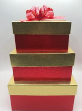 Load image into Gallery viewer, The Pamper Me! Gift Box Trio is sure to impress everyone on your gift list. This stunning box set includes two 6" pillar candles (Snowflake or Basic pillars , a Body Butter (9 scents to choose from), a Lavender Lotion Bar & a bag of Herbal Tea of your choice(Cinnamon Spice shown). The perfect, ready to go, gift to place under your tree.