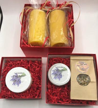 Load image into Gallery viewer, The Pamper Me! Gift Box Trio is sure to impress everyone on your gift list. This stunning box set includes two 6" pillar candles (Snowflake or Basic pillars , a Body Butter (9 scents to choose from), a Lavender Lotion Bar & a bag of Herbal Tea of your choice(Cinnamon Spice shown). The perfect, ready to go, gift to place under your tree.