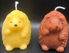 Load image into Gallery viewer, What could be cuter than a Hedgehog Beeswax Candle? Two! We offer these adorable Hedgehog Beeswax Candles standing upright or on the ground. This very detailed candle is sure to delight the hedgehog lovers in your life. Great for birthday gifts, fall decorating, housewarming gifts or Christmas gifts.