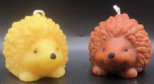 Load image into Gallery viewer, What could be cuter than a Hedgehog Beeswax Candle? Two! We offer these adorable Hedgehog Beeswax Candles standing upright or on the ground. This very detailed candle is sure to delight the hedgehog lovers in your life. Great for birthday gifts, fall decorating, housewarming gifts or Christmas gifts.