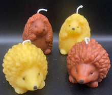 Load image into Gallery viewer, What could be cuter than a Hedgehog Beeswax Candle? Two! We offer these adorable Hedgehog Beeswax Candles standing upright or on the ground. This very detailed candle is sure to delight the hedgehog lovers in your life. Great for birthday gifts, fall decorating, housewarming gifts or Christmas gifts.