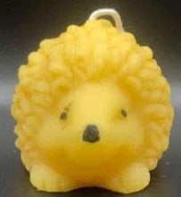 Load image into Gallery viewer, What could be cuter than a Hedgehog Beeswax Candle? Two! We offer these adorable Hedgehog Beeswax Candles standing upright or on the ground. This very detailed candle is sure to delight the hedgehog lovers in your life. Great for birthday gifts, fall decorating, housewarming gifts or Christmas gifts.