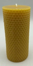 Load image into Gallery viewer, Honey comb design adorns this all natural beeswax pillar candle. Handmade in the USA. Classic honeycomb pattern 100% pure beeswax pillar candle goes perfect anywhere! The gorgeous golden hexagonal outer-crust of the candle illuminates beautifully against the flame inside the candle. This candle is a unique and thoughtful idea for a housewarming gift, or that perfect gift for the nature lover, eco-friendly conscious person in your life, or even yourself! :)