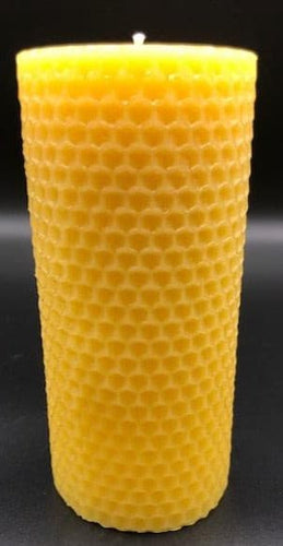 Honey comb design adorns this all natural beeswax pillar candle. Handmade in the USA.  Classic honeycomb pattern 100% pure beeswax pillar candle goes perfect anywhere! The gorgeous golden hexagonal outer-crust of the candle illuminates beautifully against the flame inside the candle. This candle is a unique and thoughtful idea for a housewarming gift, or that perfect gift for the nature lover, eco-friendly conscious person in your life, or even yourself! :)