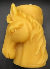 Load image into Gallery viewer, Horse design surrounds this all natural beeswax candle. Horse head on the front and wild horses running on the back side of the candle. Handmade in the USA.