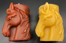Load image into Gallery viewer, Horse design surrounds this all natural beeswax candle. Horse head on the front and wild horses running on the back side of the candle. Handmade in the USA.