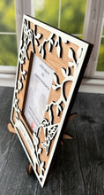 Load image into Gallery viewer, This Hummingbird Photo Frame is the perfect way to display your cherished memories with loved ones. This unique and personalized photo frame can be customized with up to 20 names in the hearts hung around the frame and custom wording in the banner across the bottom, making it a special and meaningful addition to any home decor. Available for a 4" x 6" or a 5" x 7" photo.
