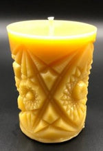 Load image into Gallery viewer, Kaleidoscope design adorns the sides of this pillar type all natural beeswax candle. Handmade in the USA.