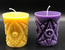 Load image into Gallery viewer, Kaleidoscope design adorns the sides of this pillar type all natural beeswax candle. Handmade in the USA.
